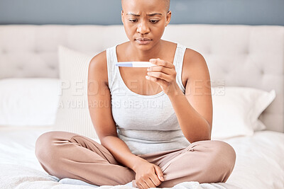 Buy stock photo Bedroom, home and black woman with pregnancy test, stress and future with results. African person, lady and girl with health, pregnant and bed with ivf, calm and natural with peace and maternal