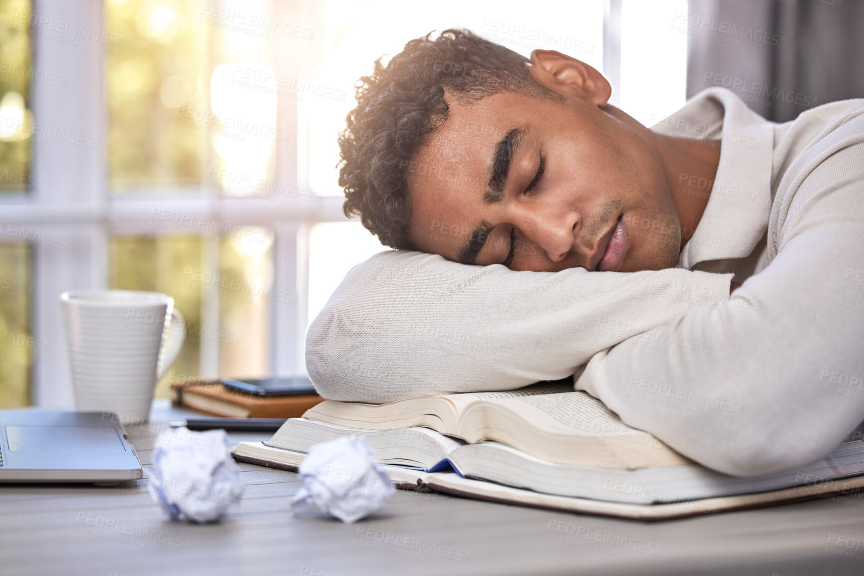 Buy stock photo Man, student and sleeping at desk, burnout and mental health or overwhelmed, education and tired. Male person, nap and exhausted by university, learning and remote work or homework, rest and fatigue