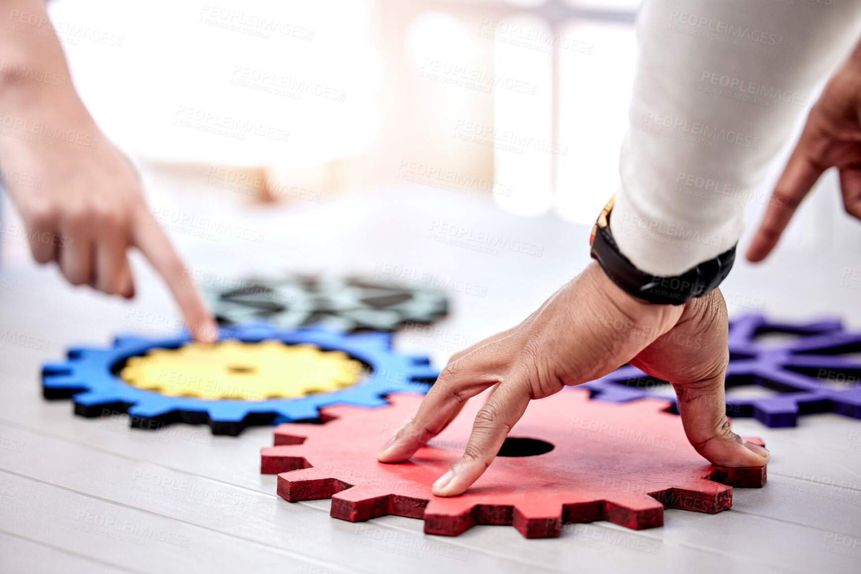 Buy stock photo Closeup, business and teamwork with gears, innovation and collaboration with engineering, problem solving and solution. Brainstorming, hands or professional with research, development and cooperation