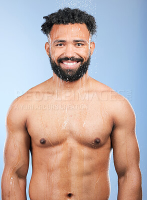 Buy stock photo Shower, cleaning and water with man portrait and smile from skincare and morning routine. Bathroom, cosmetics and male model in a studio with blue background and dermatology for wellness and wash