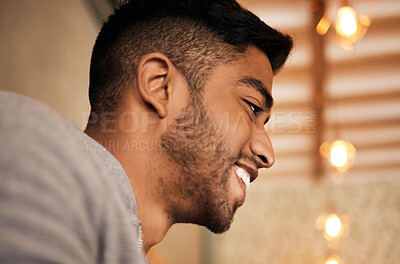 Buy stock photo Man, face and happy with thinking or closeup for ideas, positive mindset and inspiration in cafe. Indian person, smile and thoughtful in restaurant with confidence, pride and satisfaction or cheerful