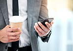 Businessman, coffee and smartphone with hands for communication on client feedback and lunch break with technology. Professional, person and email on phone with read text, social media and networking
