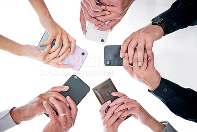 Buy stock photo Business people, hands and phone in circle from below for networking, communication or collaboration. Contact, connectivity and team with smartphone, mobile app or internet search with technology.