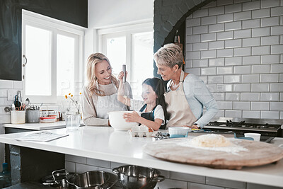 Buy stock photo Grandmother, mother and girl baking in kitchen having fun, bonding and spend quality time together. Family, love and grandma and mom teaching child how to cook, bake and develop chef skills at home