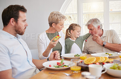 Buy stock photo Big family home, children and together at breakfast, eating or talk for help, dad or grandparents at table. Men, women and kid for food, fruit or lunch for memory, conversation or chat in dining room