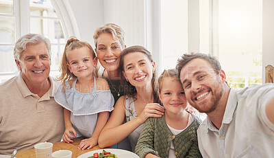 Buy stock photo Parents, grandparents and children with selfie, dinner and portrait for memory, happy and together in family home. Men, women and kids with food, profile picture or brunch with love on social media