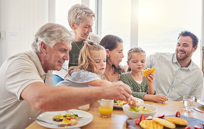 Buy stock photo Parents, children and grandparents at breakfast, happy and eating together on holiday, bonding and food in family home. Men, women and girl kids with fruits, waffles and diet choice in dining room