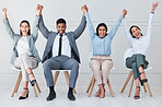 Interview, portrait and excited business people in waiting room with arms up, happy or holding hands in solidarity. Onboarding, success and face of employees with we are hiring motivation or support