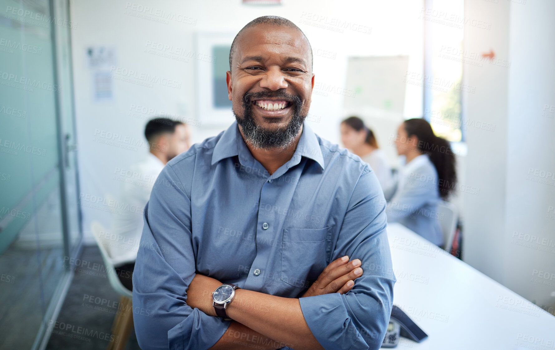 Buy stock photo Crossed arms, meeting and portrait of business black man for conversation, collaboration and discussion. Corporate office, professional and happy person with staff for teamwork, planning and feedback