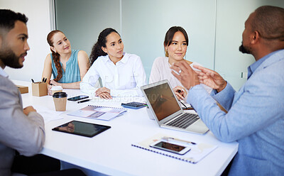 Buy stock photo Businessman, team and discussion with laptop in boardroom for collaboration, leadership or advice. Diversity, mentor and talking for guidance, training or strategy for online, report and document