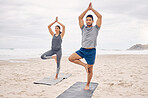 People, yoga and tree pose on beach for fitness, exercise and holistic wellness and teamwork outdoor. Couple of friends or instructor with balance, pilates and health or calm workout by ocean or sea