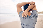 Man, stretching and arms on beach, exercise and warm up for fitness, ready and workout by ocean. Male person, back and active in outdoors, challenge and prepare for performance, training and shore