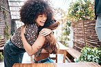 Friends, hug and happy for reunion, women and love or excited for meeting, fun and union at restaurant. People, embrace and solidarity or connection, support and greeting at cafe, smile and joy