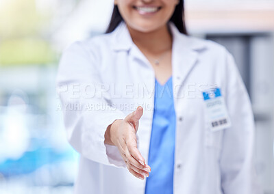 Buy stock photo Doctor, open hand shake and woman with welcome, respect or greeting in hospital, hiring and smile. Female medic, handshake and kindness for partnership, recruitment or agreement in clinic office