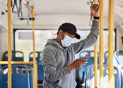 Buy stock photo Bus travel, smartphone and man with a mask, safety protection and typing with social media. Person, traveller and guy with face cover, covid regulations or cellphone with public transportation or app