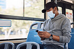 Mask, phone and man travel in bus, journey and typing email on mobile app technology. Smartphone, public transport and person on internet, social media or networking on commute to city with covid ppe