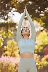 Yoga, nature and woman doing a meditation exercise in an outdoor garden for peace, zen and calm. Healthy, spiritual and girl doing a pilates workout for wellness, health and natural balance in a park