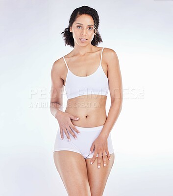 Buy stock photo Fitness, wellness and portrait of black woman with slim body isolated on white background in studio. Beauty, exercise and female with healthy skin in underwear for diet, weight loss and body care