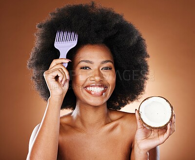 Buy stock photo Hair care, comb and portrait girl with coconut for afro hair growth, healthy hair hydration or moisturizing hairstyle treatment. Fruit product, wellness and face of black woman with natural routine