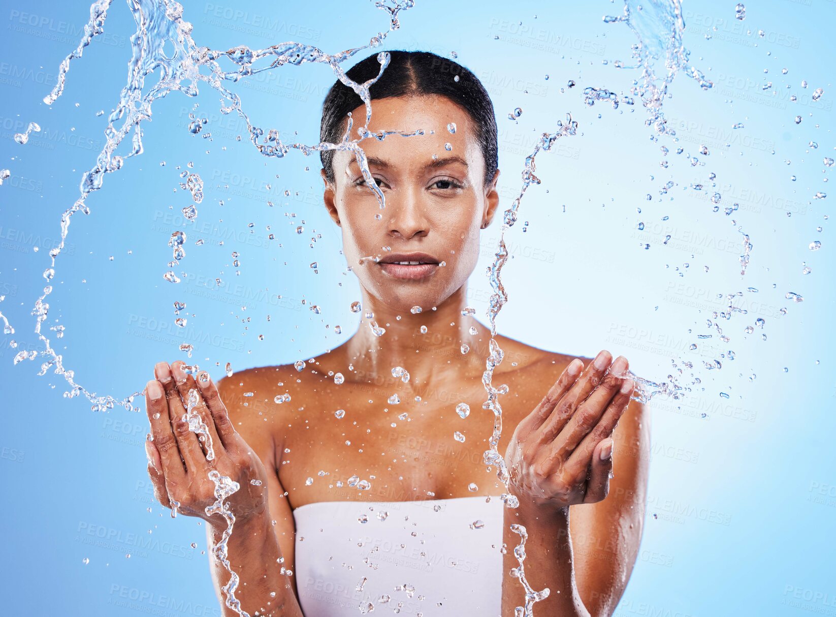 Buy stock photo Facial cleaning, water splash and black woman skincare wellness, shower and hygiene and clean in studio background. Bathroom, beauty and cleanliness with a model washing her skin for fresh care