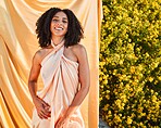 Beauty, fashion and portrait of black woman in garden on outdoor shoot with silk fabric backdrop and plants in summer sun. Elegance, glamour and happy woman with afro, smile and nature in background.