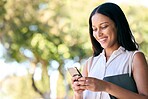 Business woman, phone and outdoor typing on website search or mobile networking. Nature park, smile and 5g internet scroll on social media with employee happy about e commerce deal with bokeh mockup