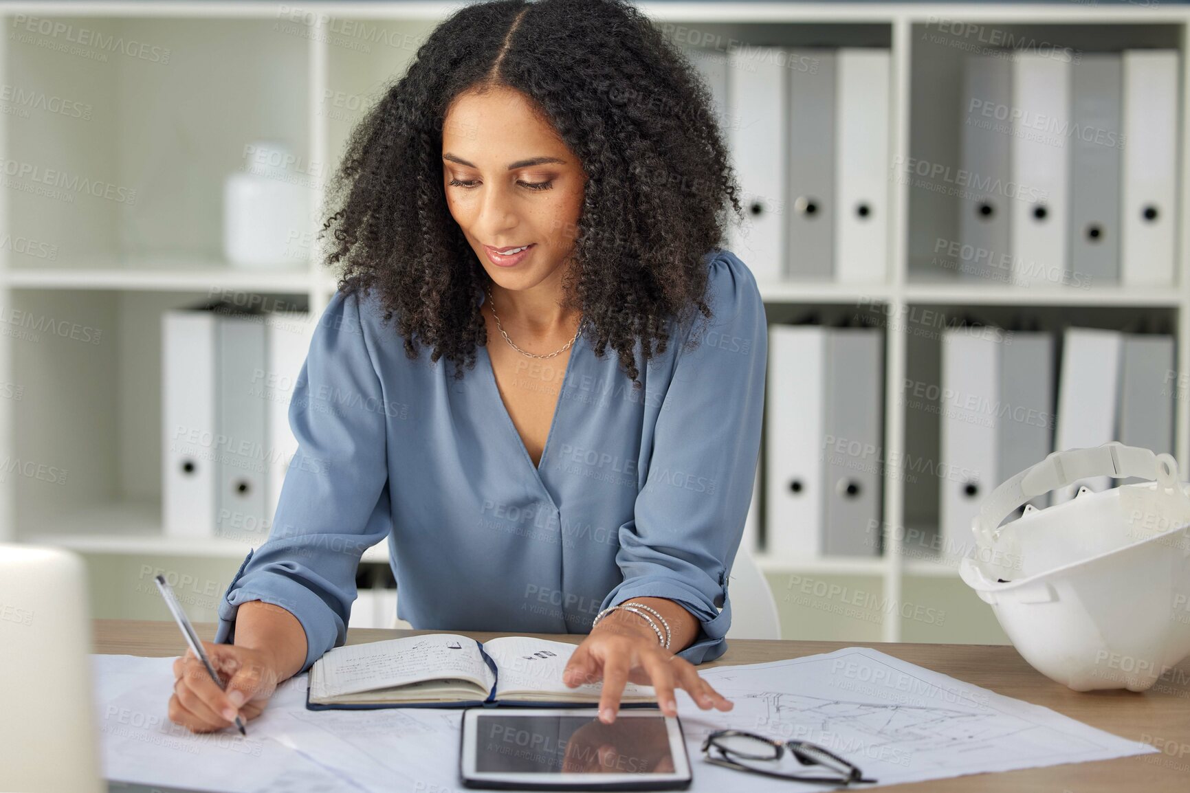 Buy stock photo Architecture, engineering and woman with blueprints writing notes on tablet and notebook in office. Strategy, planning and design, black woman architect working on building plans and online documents