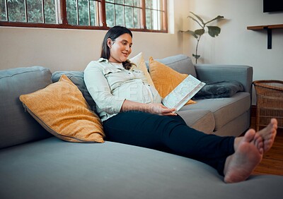 Buy stock photo Pregnancy, reading and woman with a book on the sofa for her baby, relax and peace in the living room of a house. Education, calm and happy pregnant mother with a story for her unborn child on couch