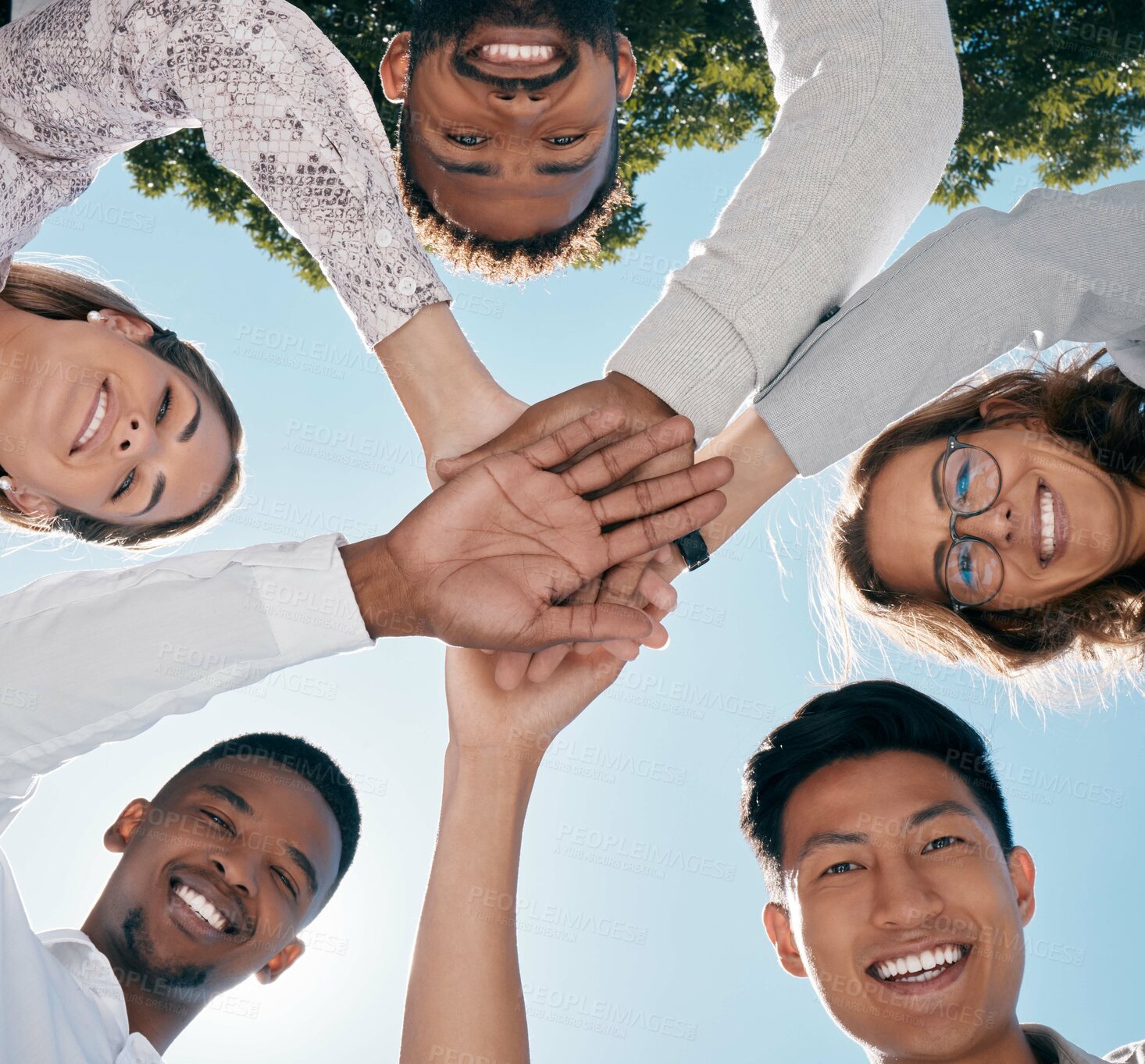 Buy stock photo Team hands, face and happy employee support for business success, diversity solidarity and collaboration outdoor. Teamwork, interracial employees and team building holding hands together for goals