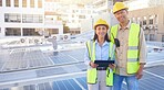 Solar energy, building and engineer team portrait with tablet, smile or rooftop for sustainability. Man, woman and solar panel in city for renewable energy on roof with mobile tech, teamwork and goal