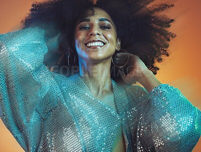 Buy stock photo Beauty, hair and black woman with blur, face and movement with makeup and glitter against studio background. Hair care, natural curly hair and cosmetics with happiness and portrait, disco and fashion