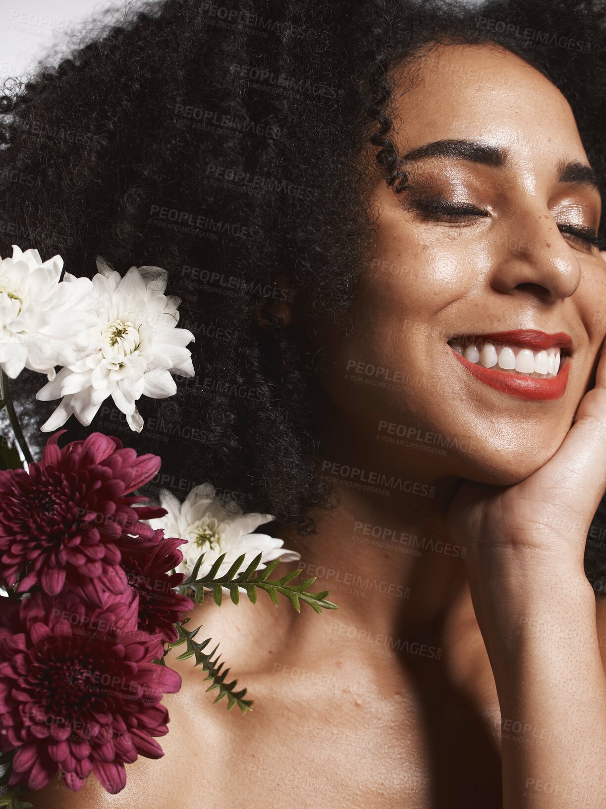 Buy stock photo Wellness, flowers and beauty aesthetic model with skincare satisfaction and glowing texture routine. Aesthetic, health and makeup of black woman cosmetics model with beautiful smile in white studio

