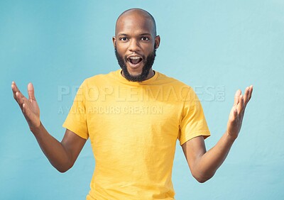 Buy stock photo Portrait, wow and surprise with a black man in studio on a blue background feeling shocked or in awe. Announcement, news or gesture and a surprised male looking on in wonder with an omg expression