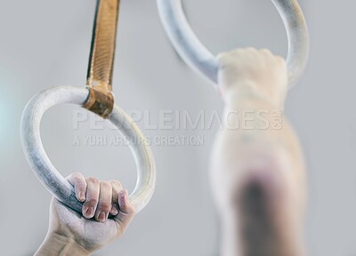 Buy stock photo Gymnast rings, fitness and hands zoom in a health, wellness and training center. Hand powder zoom, athlete and action performance of a man doing sports, gymnastics and competition with strength