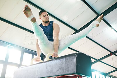 Buy stock photo Fitness, gymnastics and man on a balance beam for training, cardio and strength at gym. Athletic, male and acrobat practice speed, control and sport routine for muscle, power or endurance performance