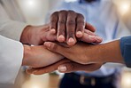 Office, teamwork and diversity, hands together in huddle for team building, collaboration and motivation at startup. Men, women and employees mission in solidarity for business growth or development.