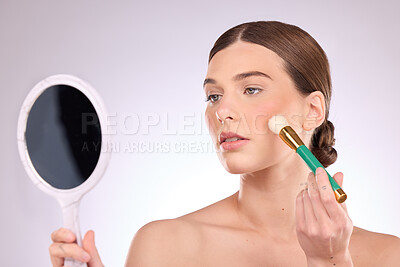 Buy stock photo Makeup, hand mirror or woman with brush, beauty or facial cosmetics isolated on studio background. Self love, skincare or girl grooming with luxury powder for glowing smooth skin in face routine 