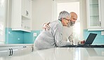 Elderly couple, laptop and video call in kitchen, web browsing or social media in house. Computer, retirement and happy man and woman on videocall, online chat and virtual communication together.