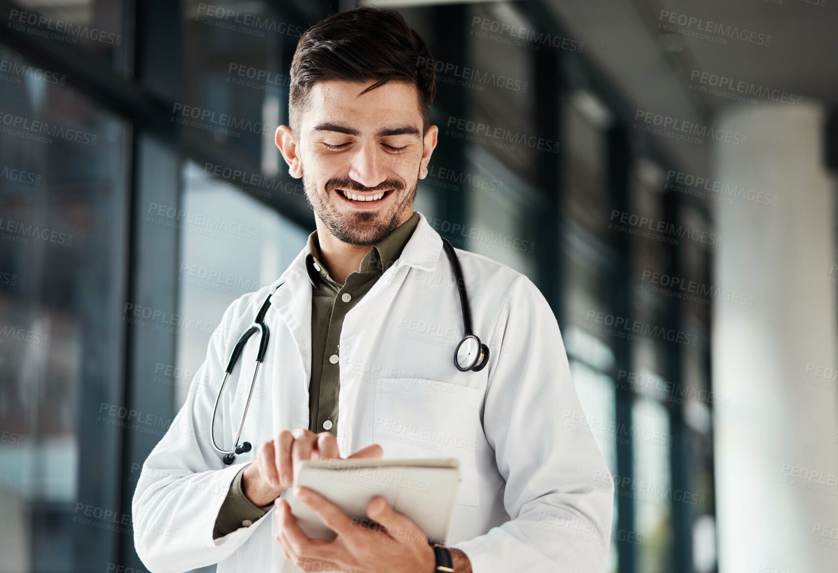 Buy stock photo Happy, man and doctor with tablet in hospital for Telehealth, advice and social chat or research. Healthcare, news and male health expert smile for online, website or internet communication at clinic