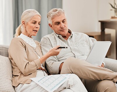 Buy stock photo Old people with life insurance application, retirement and reading paperwork, partner with investment or asset management. Couple in marriage, financial planning together and policy documents at home