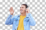 Headphones, man and happy dance on pink background, wall backdrop or studio mockup. Excited guy listening to music, sound and streaming audio media with freedom, smile and hearing radio for dancing 