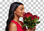 Face, beauty and a woman smelling a roses on a studio background