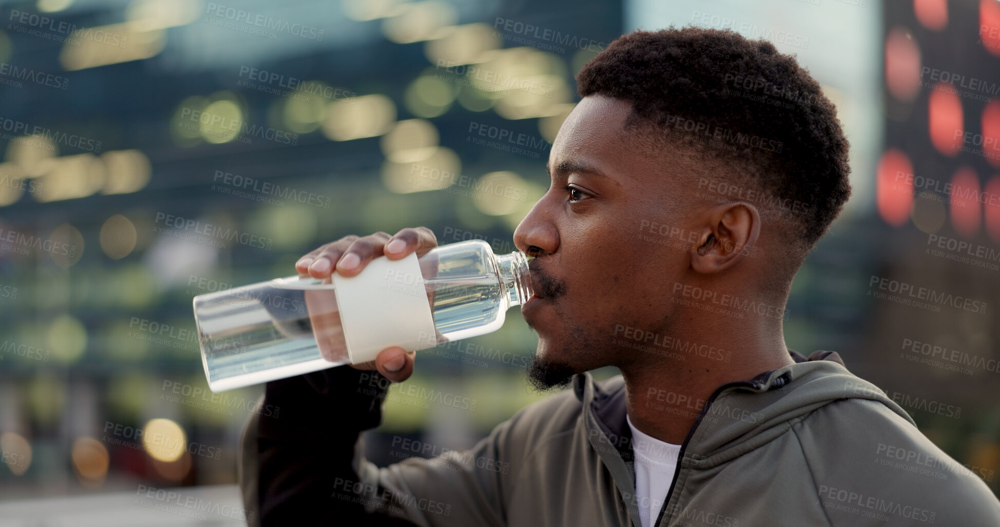 Buy stock photo Black man, drinking water and fitness in city after workout, exercise or outdoor training for natural sustainability. Thirsty African male person with mineral drink on break for hydration in town