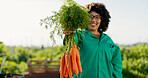 Farmer, woman and carrot in agriculture, greenhouse and farming for sustainability, grocery and gardening offer. Worker portrait or supplier of vegetables, food and ngo, nonprofit or business harvest