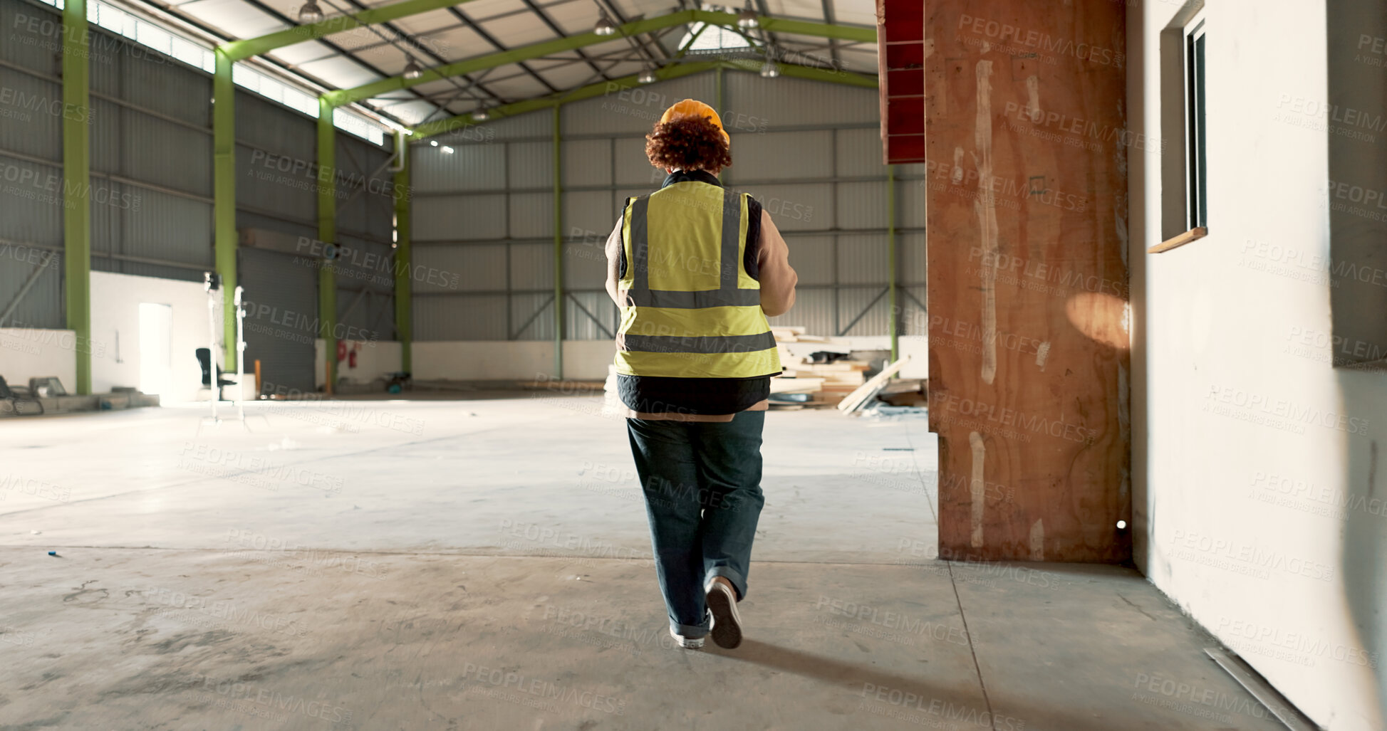 Buy stock photo Warehouse, back of woman and engineer walking at empty industrial plant, manufacturing production or construction. Factory, rear view and worker or technician check storage, distribution or logistics