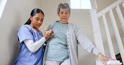 Buy stock photo Senior woman, nurse and help on stairs, retirement home and caregiver for support, trust and nursing. Careful, empathy and elderly for healthcare, injury and disability for patient, respect and job
