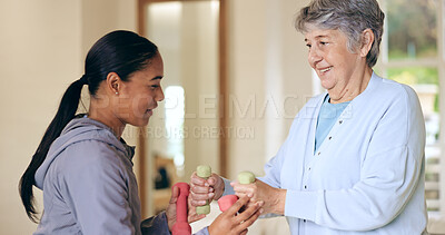 Buy stock photo Dumbbell weights, rehabilitation and an old woman with a caregiver in a nursing home for training. Health, fitness or exercise with a senior patient and volunteer in a living room for physiotherapy