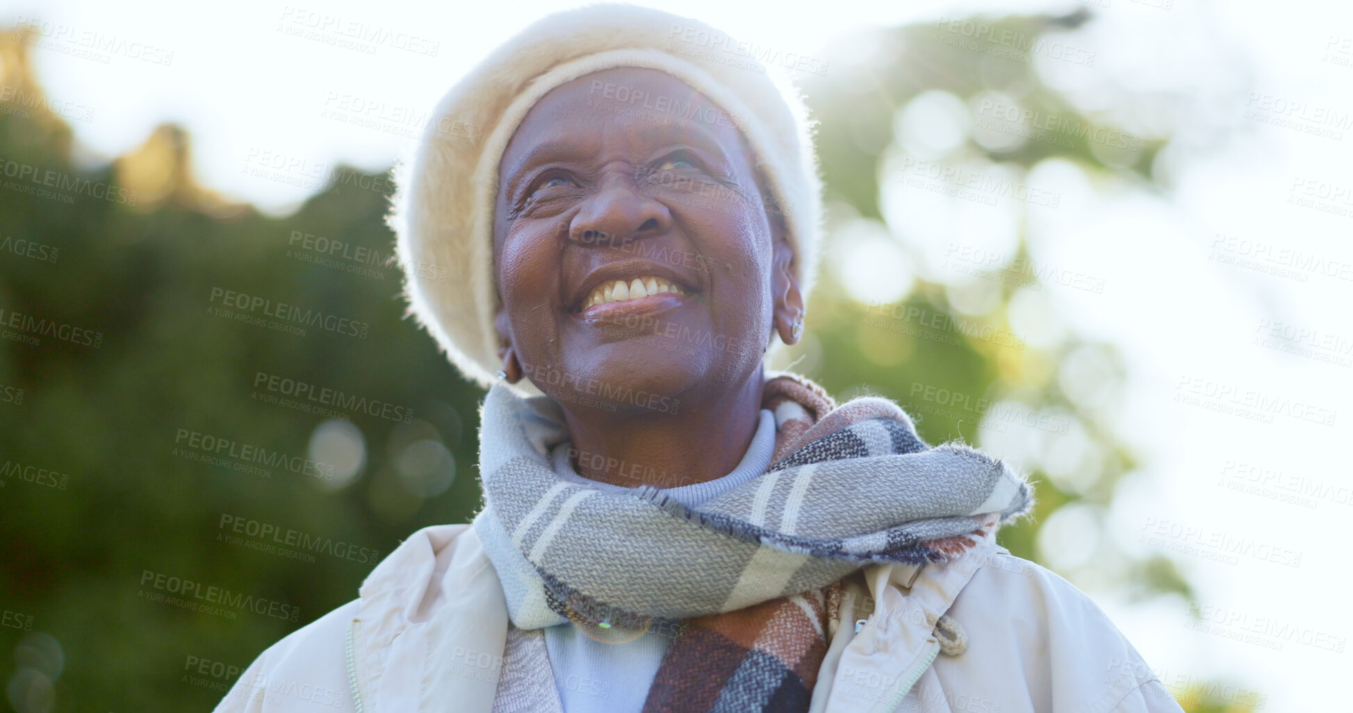 Buy stock photo Face, thinking and smile with a senior black woman outdoor in a garden during summer for freedom. Nature, environment and happy with a nostalgic elderly person in a park for retirement wellness