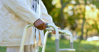 Buy stock photo Hands, walking frame and a senior person in a garden outdoor in summer closeup during retirement. Wellness, rehabilitation or recovery and an elderly adult with a disability in the park for peace