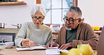 Senior couple, paperwork and contract with signature and life insurance information for will and policy. Testament, agreement and document for process and legal review in print in a retirement home